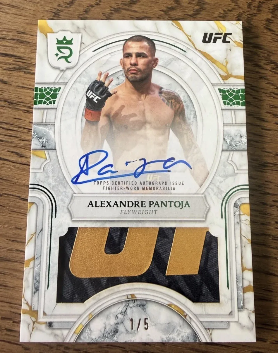 2026 Topps Royalty UFC Alexandre Pantoja autograph relic card numbered 1/5 with a gold lettering patch on black fabric and green trim